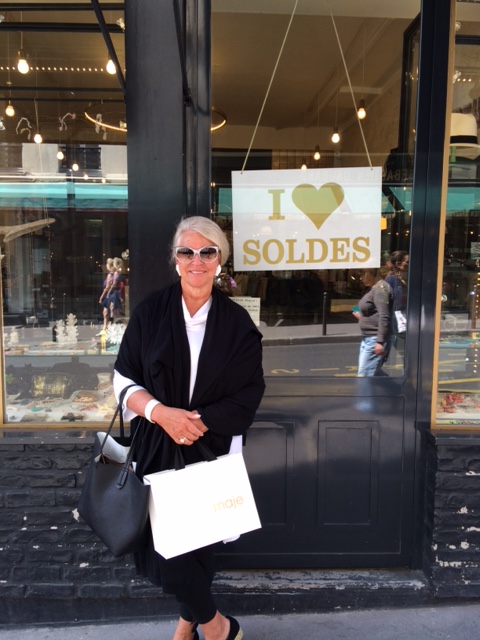 Cindy shopping on Rue des Martyrs